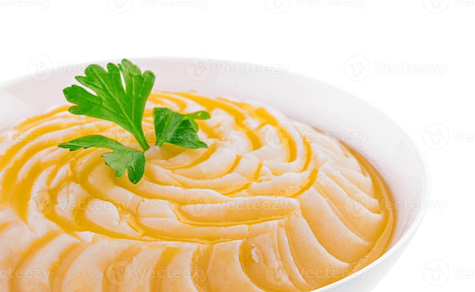 Bowl with mashed potatoes on white background photo