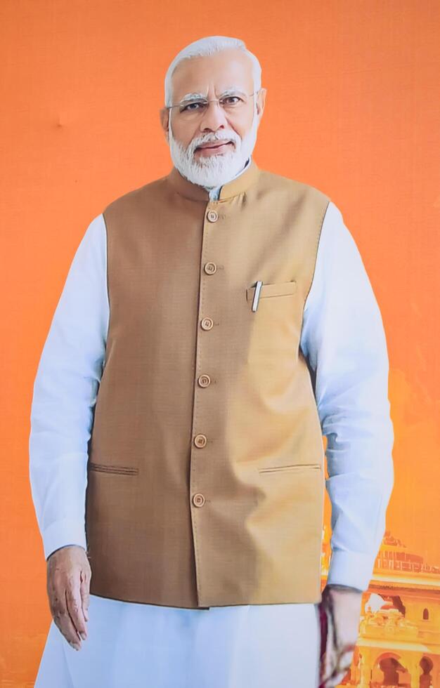 New Delhi, India - February 17 2024 - Prime Minister Narendra Modi cut out during BJP road show, the poster of PM Modi while attending a big election rally in the capital photo