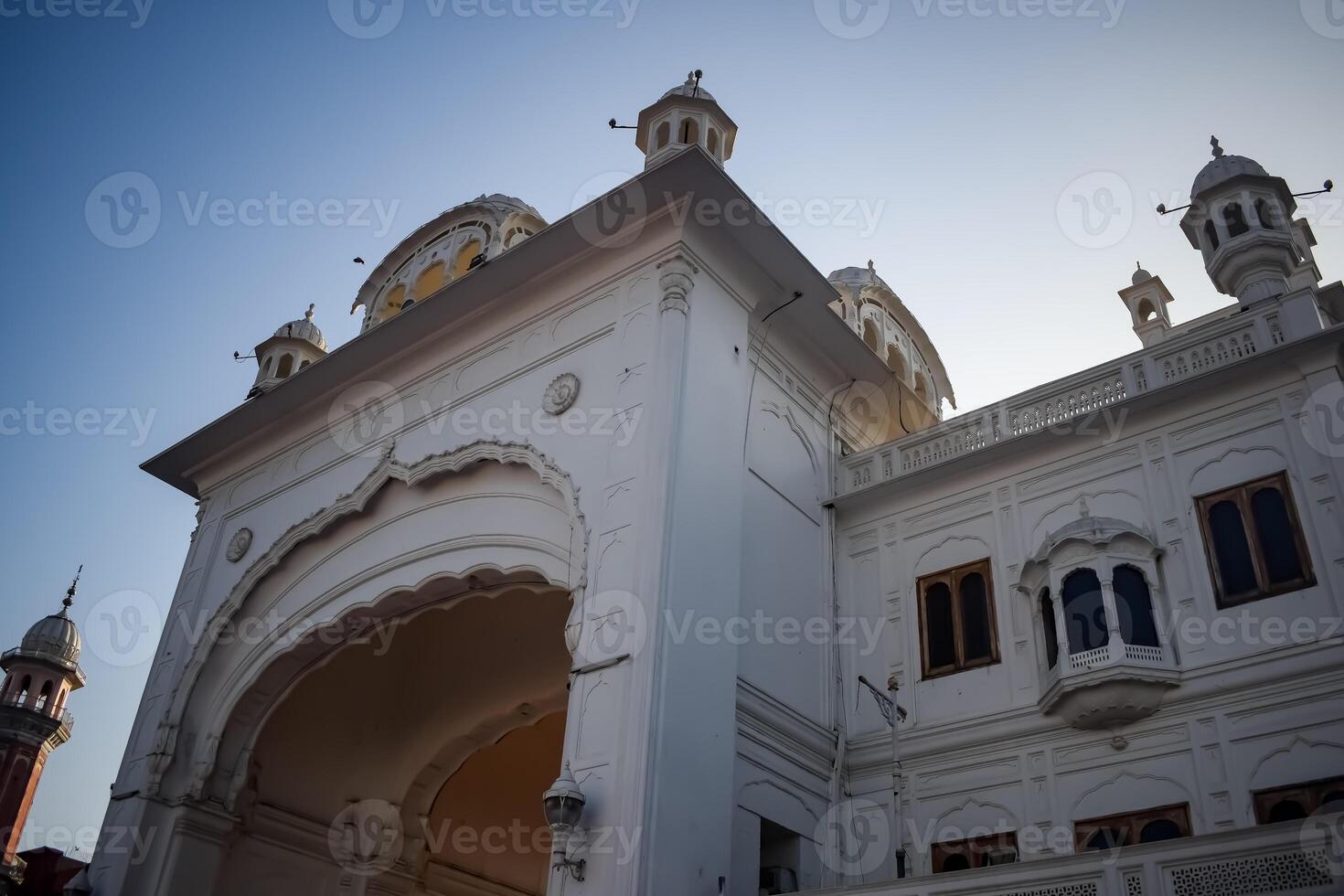 View of details of architecture inside Golden Temple - Harmandir Sahib in Amritsar, Punjab, India, Famous indian sikh landmark, Golden Temple, the main sanctuary of Sikhs in Amritsar, India photo
