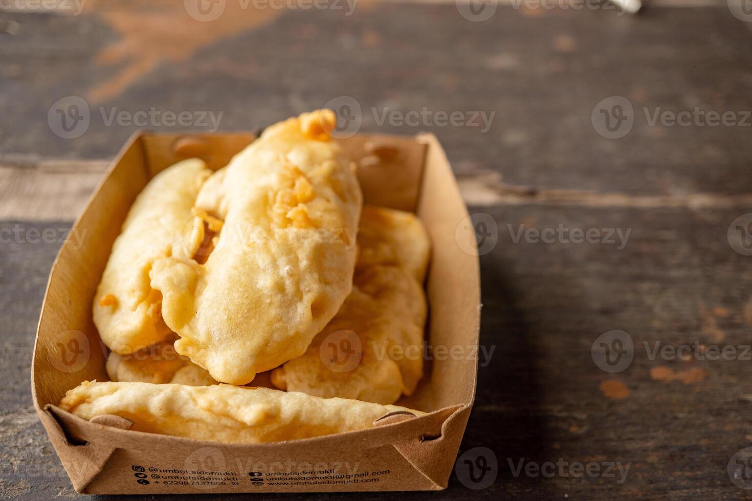 Banana fried traditional snack food Indonesia on the restaurant. The photo is suitable to use for traditional food background and snack content media.