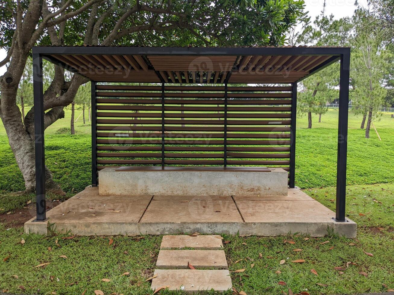 Shelter for mini bus on the garden and harbours. The photo is suitable to use for transportation content media and transportation advertising.