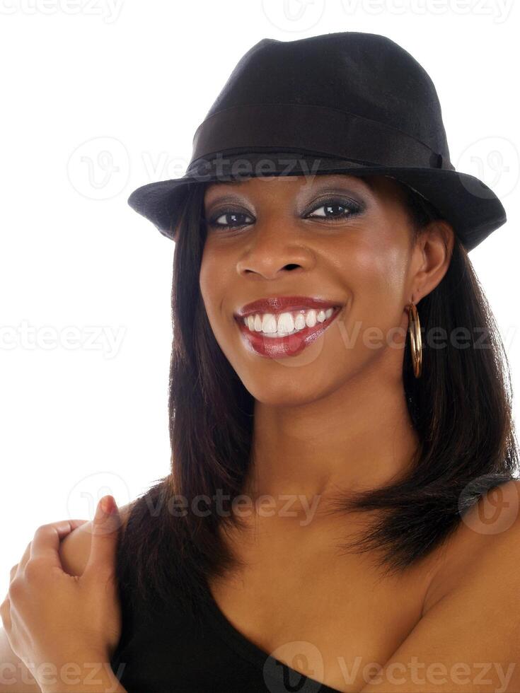Young black woman in hat with smile photo