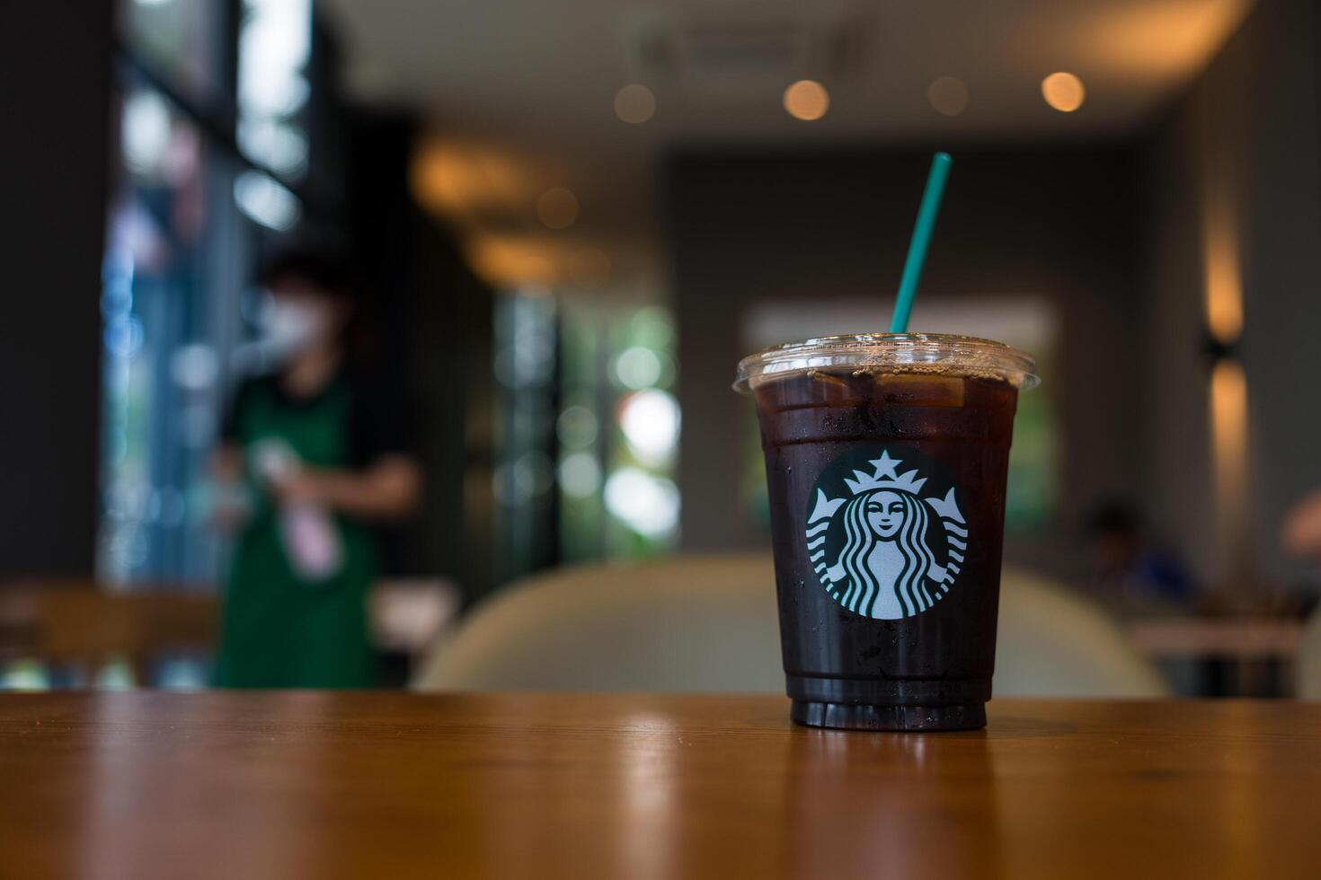 Bangkok, Thailand - March 9, 2024 Close up a glass of iced Americano at Starbucks coffee shop. photo