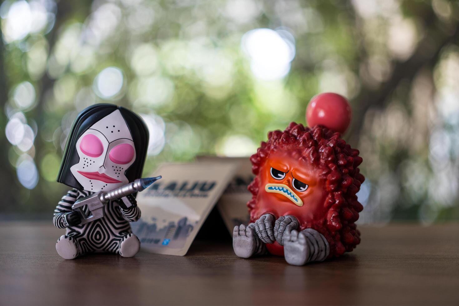 Bangkok, Thailand - March 9, 2024 Dada KAIJU and Pogmon Sitting in a Row Series Figures. photo
