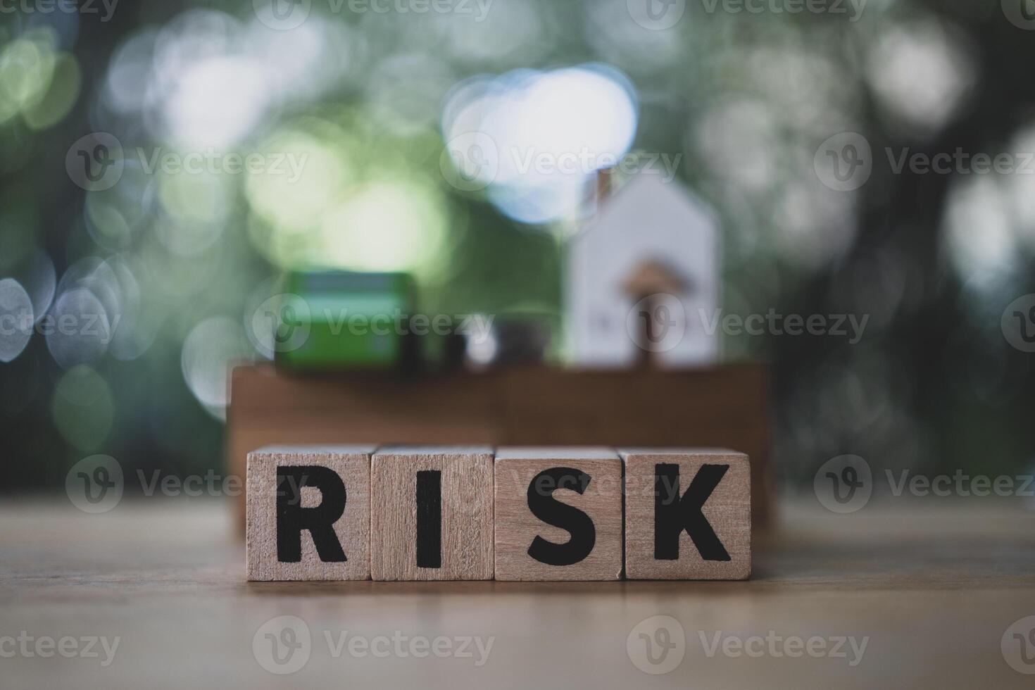 Risk factors. Risky business environment with home, car and money. photo