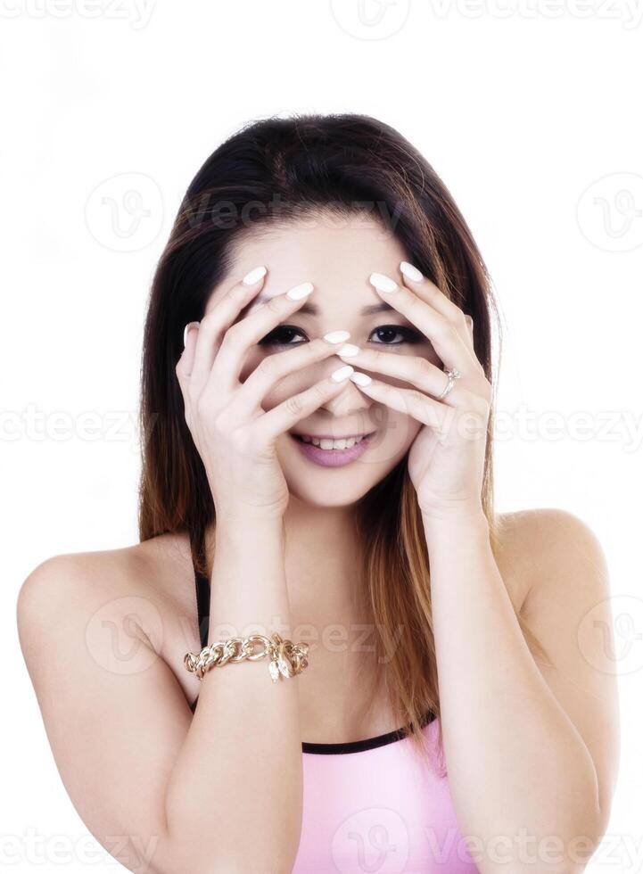 Asian American Woman With Hands On Face Smiling photo