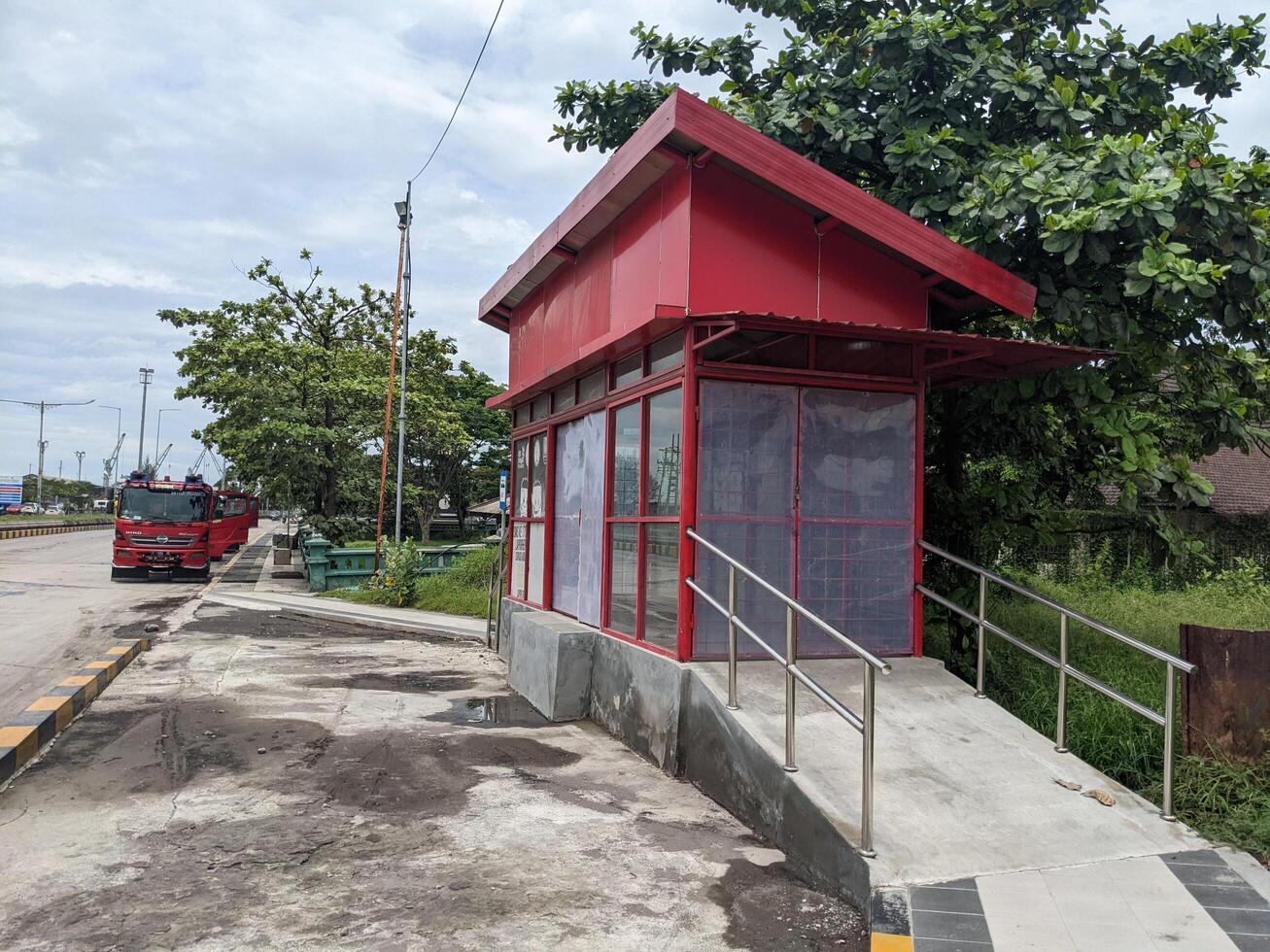 Shelter for mini bus on the garden and harbours. The photo is suitable to use for transportation content media and transportation advertising.