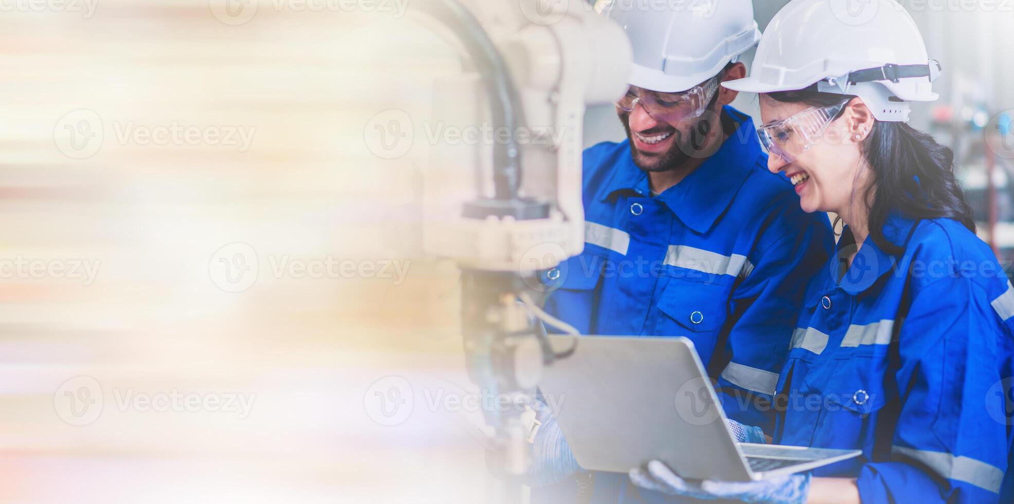 Engineers mechanic using computer controller Robotic arm for welding steel in steel factory workshop. Industry robot programming software for automated manufacturing technology. photo