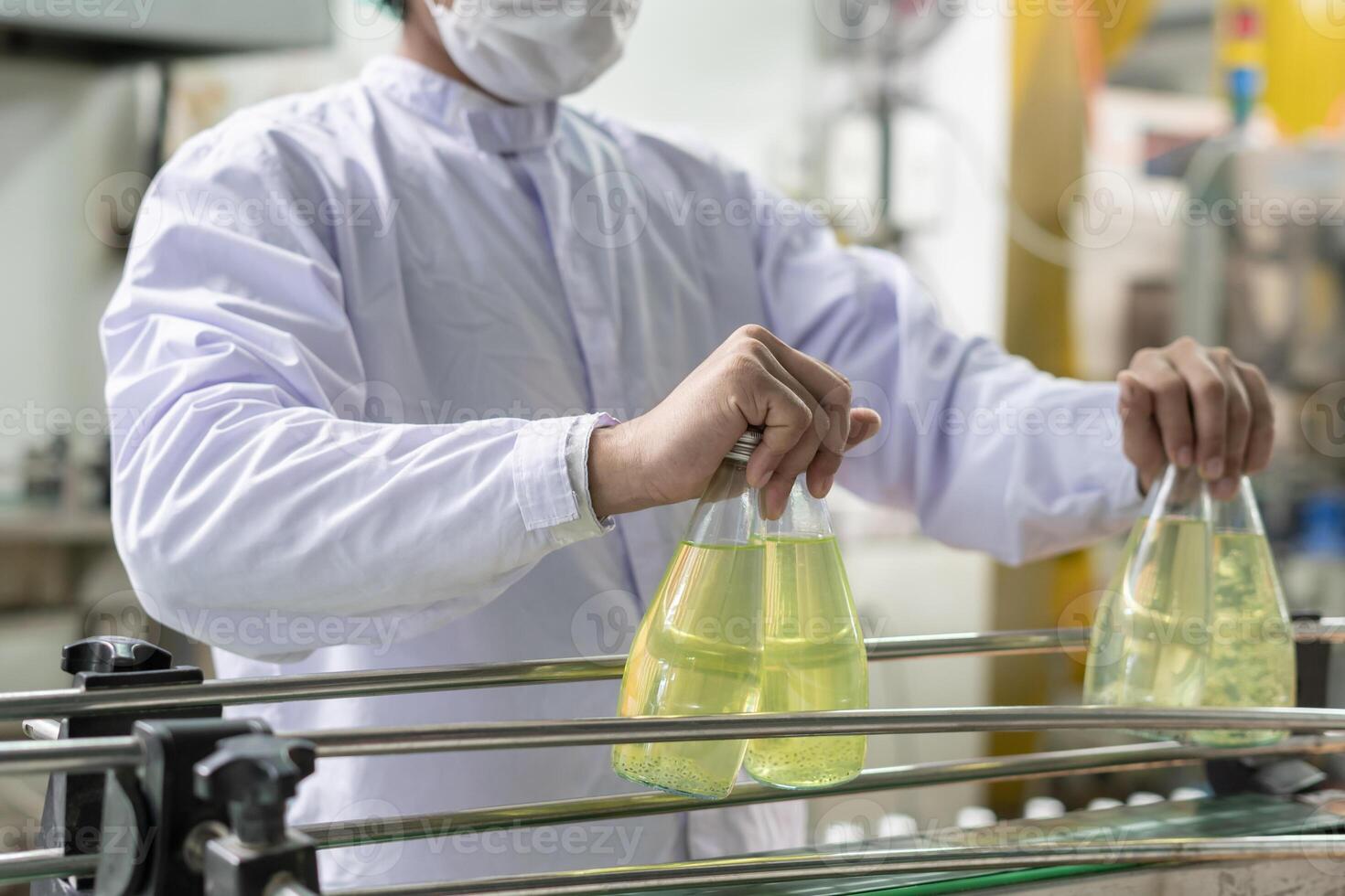 quality inspector food or beverages technician inspection about quality control food or beverages before send product to the customer. Production leader recheck ingredient and productivity. photo