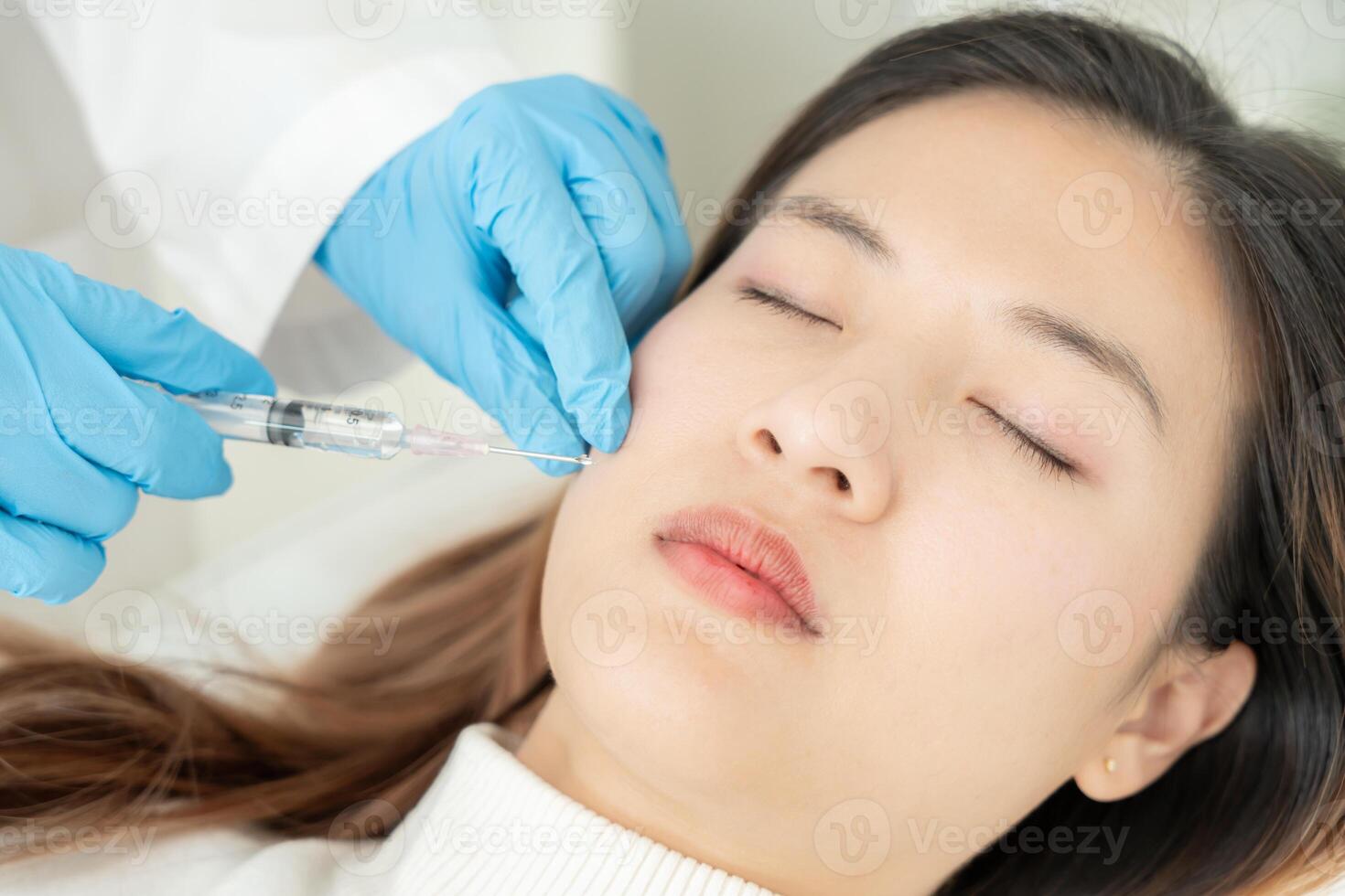Cosmetic surgery, skin whitening injection, filler injection, Skin reface, beautiful Asian girls receive beauty treatments at beauty clinic, skincare, pore rejuvenation, wrinkle, baby face photo