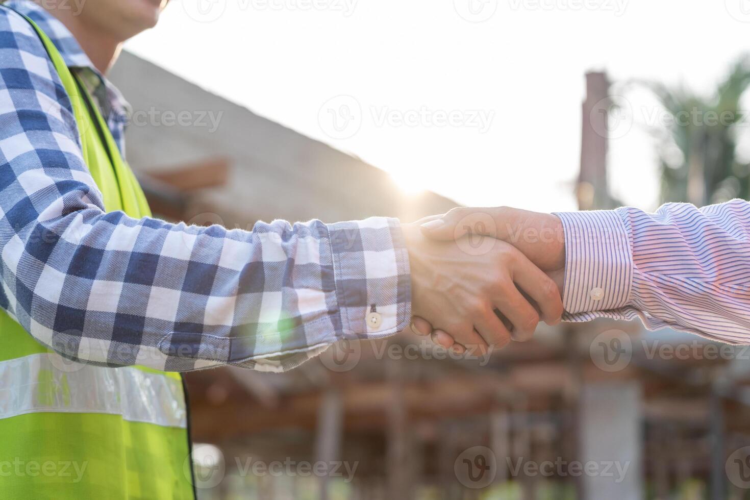 Construction team hands shaking greeting start up plan new project contract in office center at construction site, industry ,architecture, partner, teamwork, agreement, property, contacts. photo