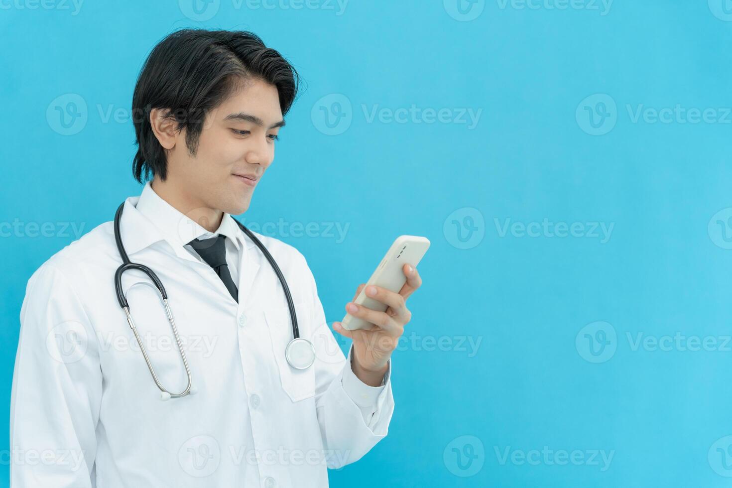 telemedical. Doctor explains the medication to the patient by video conference. Asian doctor is treating patients through telecommunication while describing the disease . Technology for health. photo