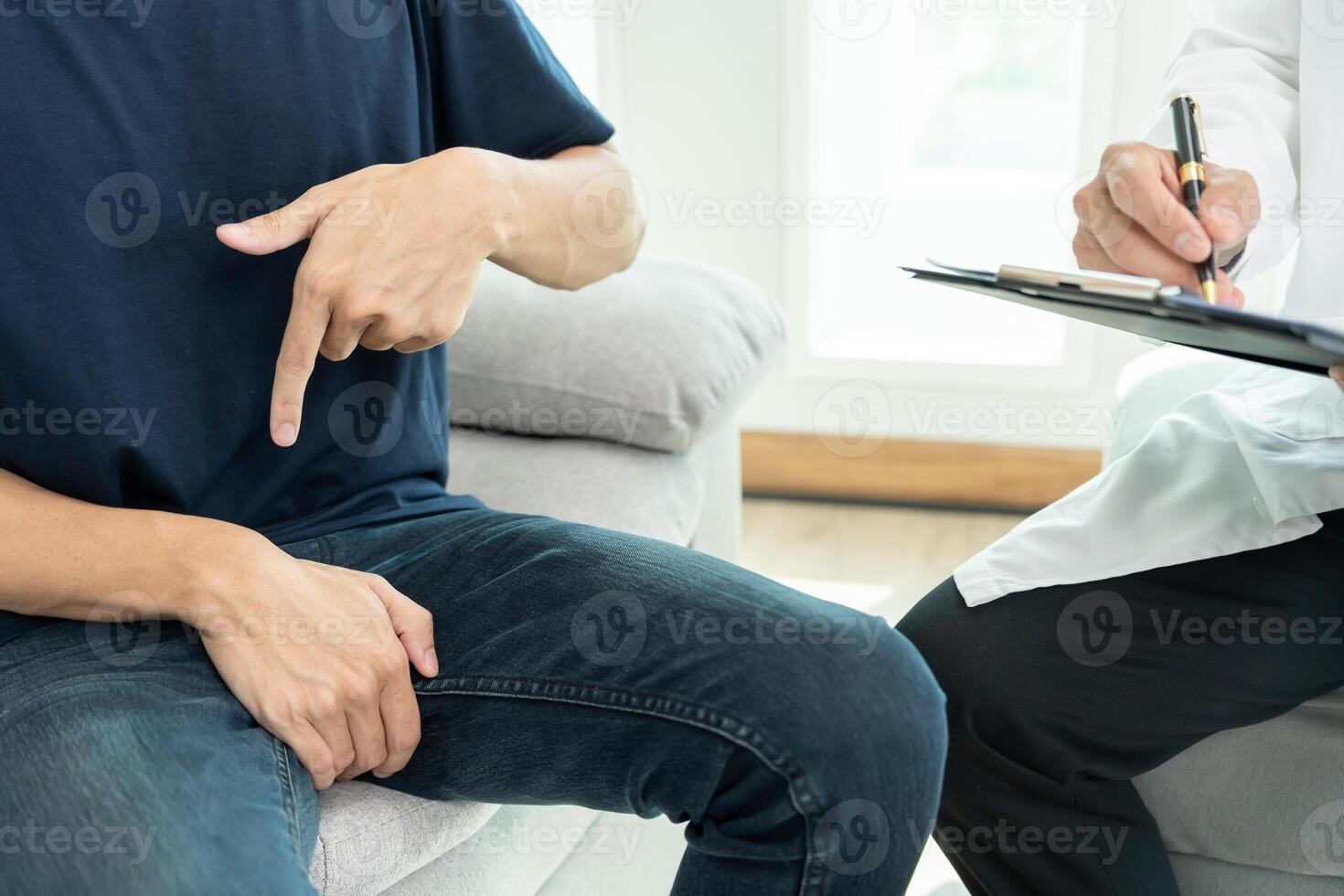 Man hold hand in front of private parts feeling discomfort and consult doctor. Venereal, testicular cancer. bladder problems, erectile dysfunction, premature ejaculation, prostate cancer photo