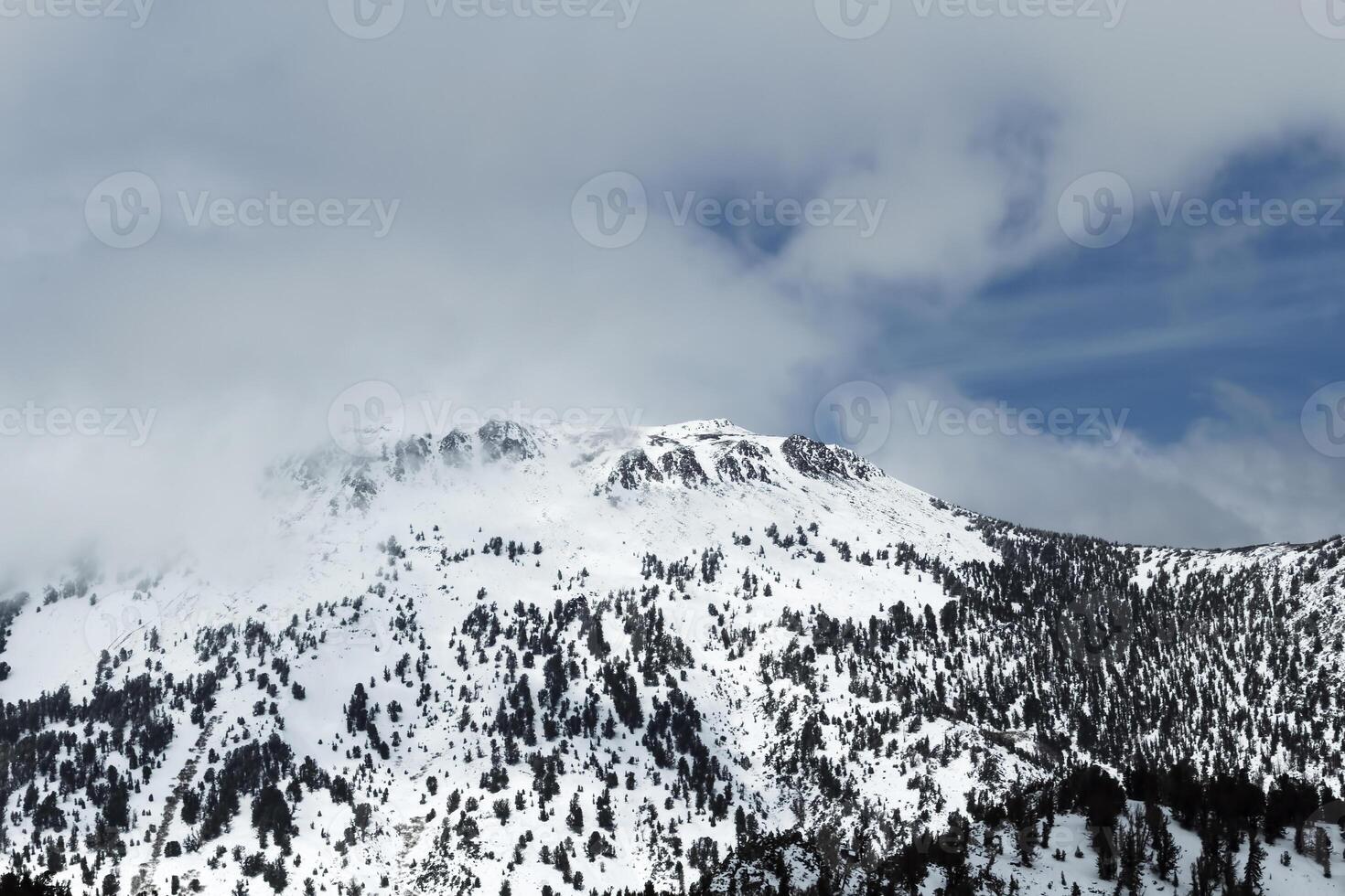 Mount Rose Nevada Covered In Snow With Clouds photo