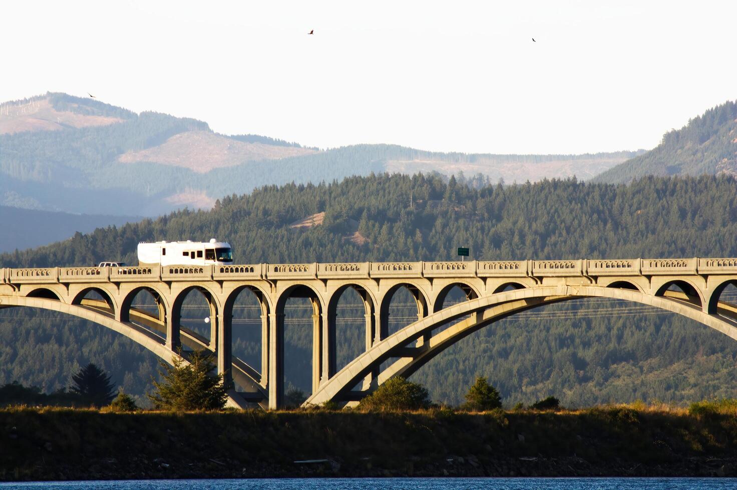 Gold Beach, OR, 2012 - Bridge Over Rogue River Oregon With Hills And Sky photo