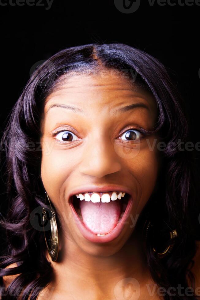 Wide Mouth Expression On Young African American Woman photo