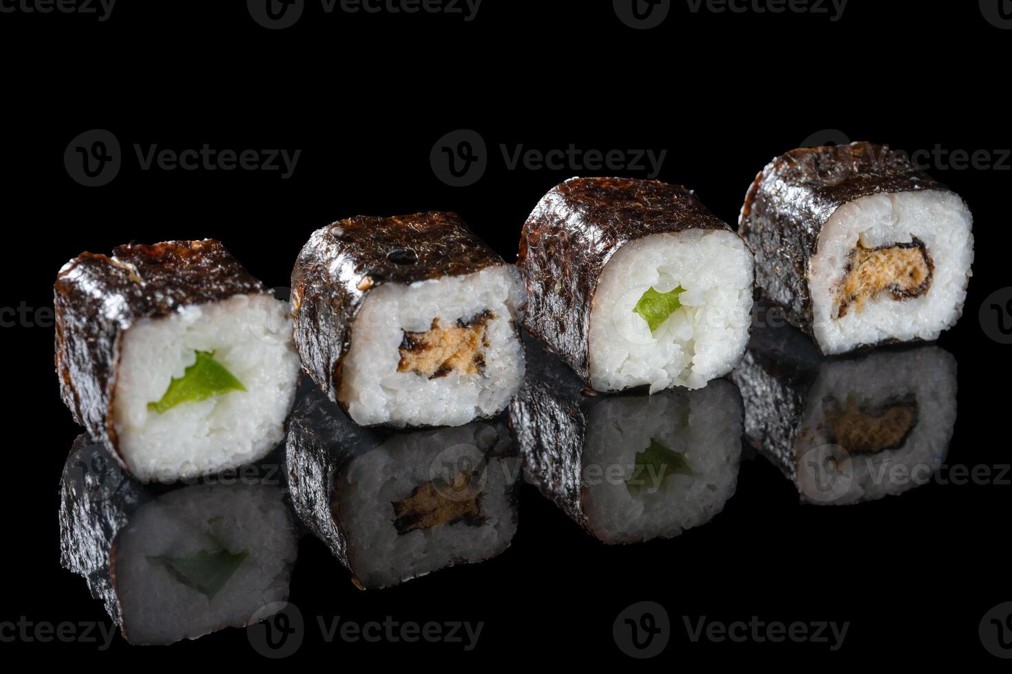 sushi roll with green onion and cucumber photo