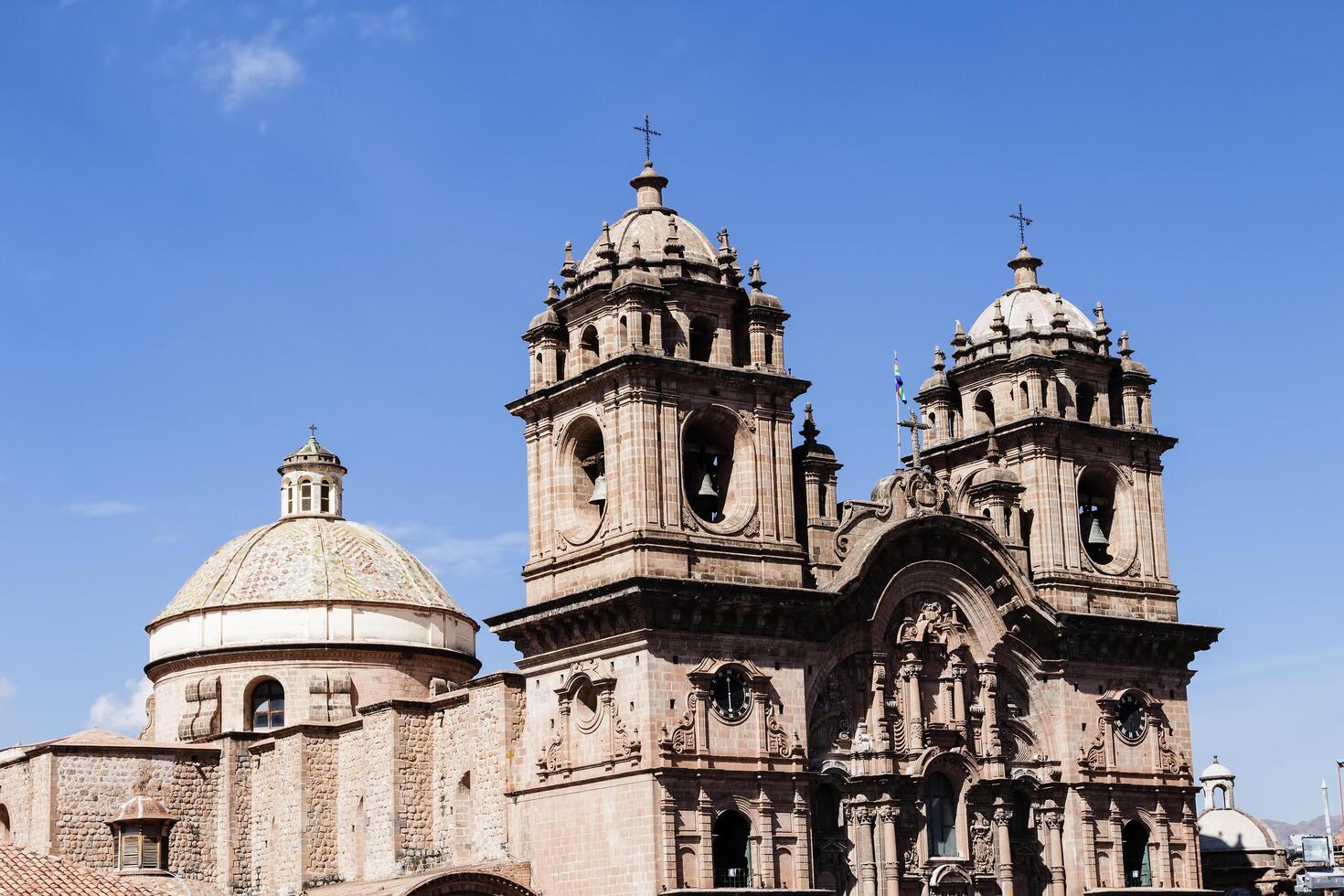 Cusco, Peru, 2015 - Upper Part Of Cathedral Against Blue Sky South America photo