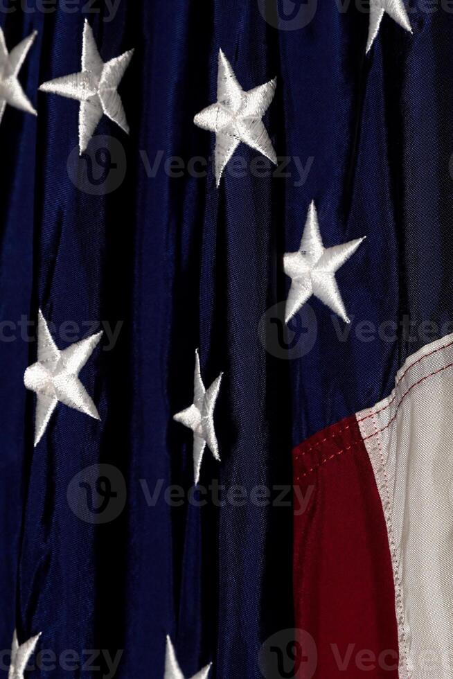 Closeup Of United States Flag Hanging Indoors photo