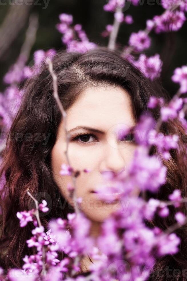 Outdoor Portrait Young Brunette Caucasian Woman Amid Blossoms photo