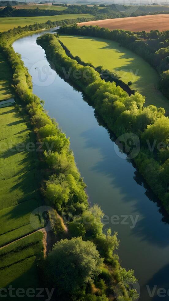 ai generado tranquilo campo perezoso río serpenteante mediante verde valles foto