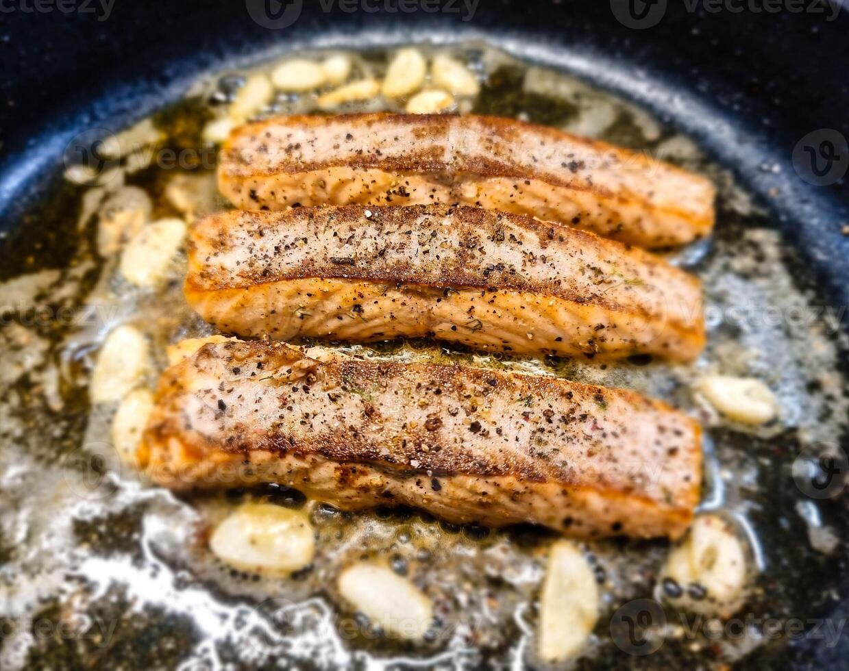 Fresh Salmon filet with herbs and spices photo