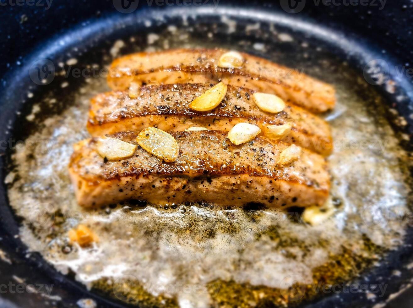 Fresh Salmon filet with herbs and spices photo