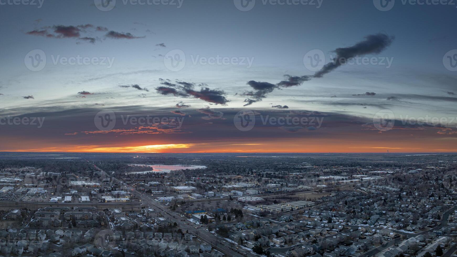 winter sunrise over midtown of Fort Collins and plains in northern Colorado, aerial panorama photo