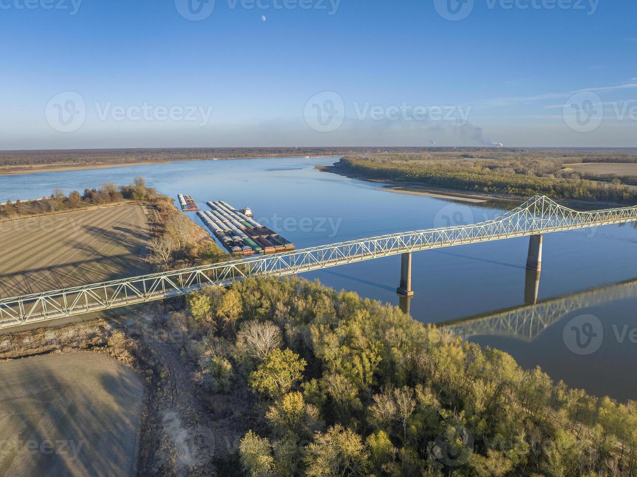 bridge and barges on the Mississippi  River at confluence with the Ohio River below Cairo, IL, November aerial view photo