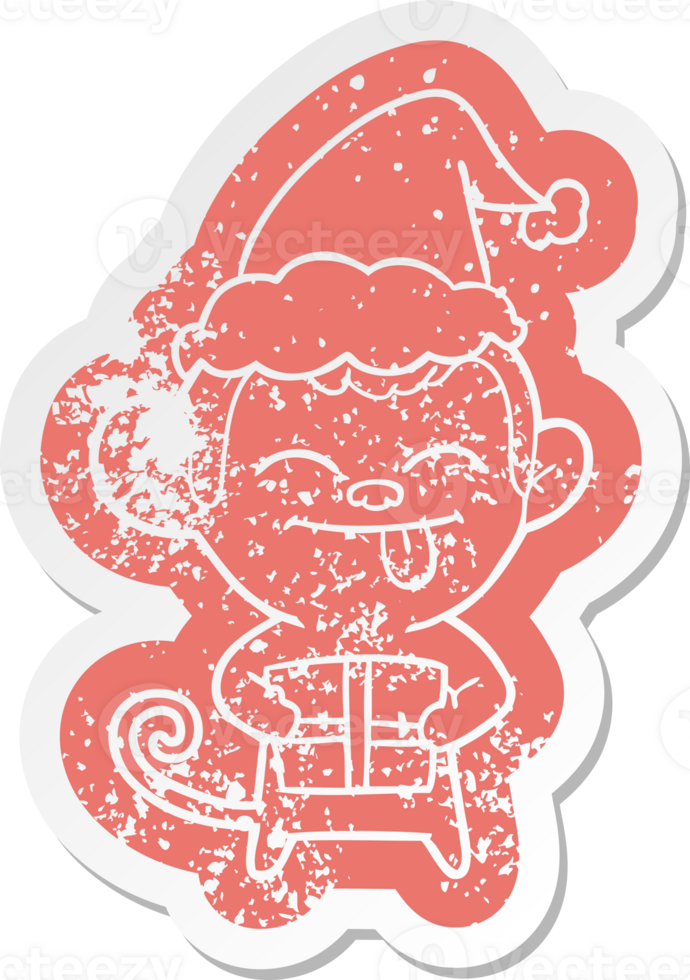 funny cartoon distressed sticker of a monkey with christmas present wearing santa hat png