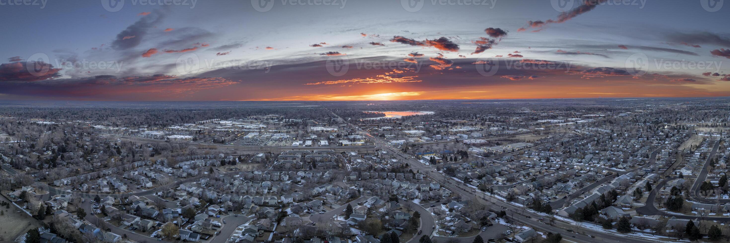 winter sunrise over city of Fort Collins and plains in northern Colorado, aerial panorama photo