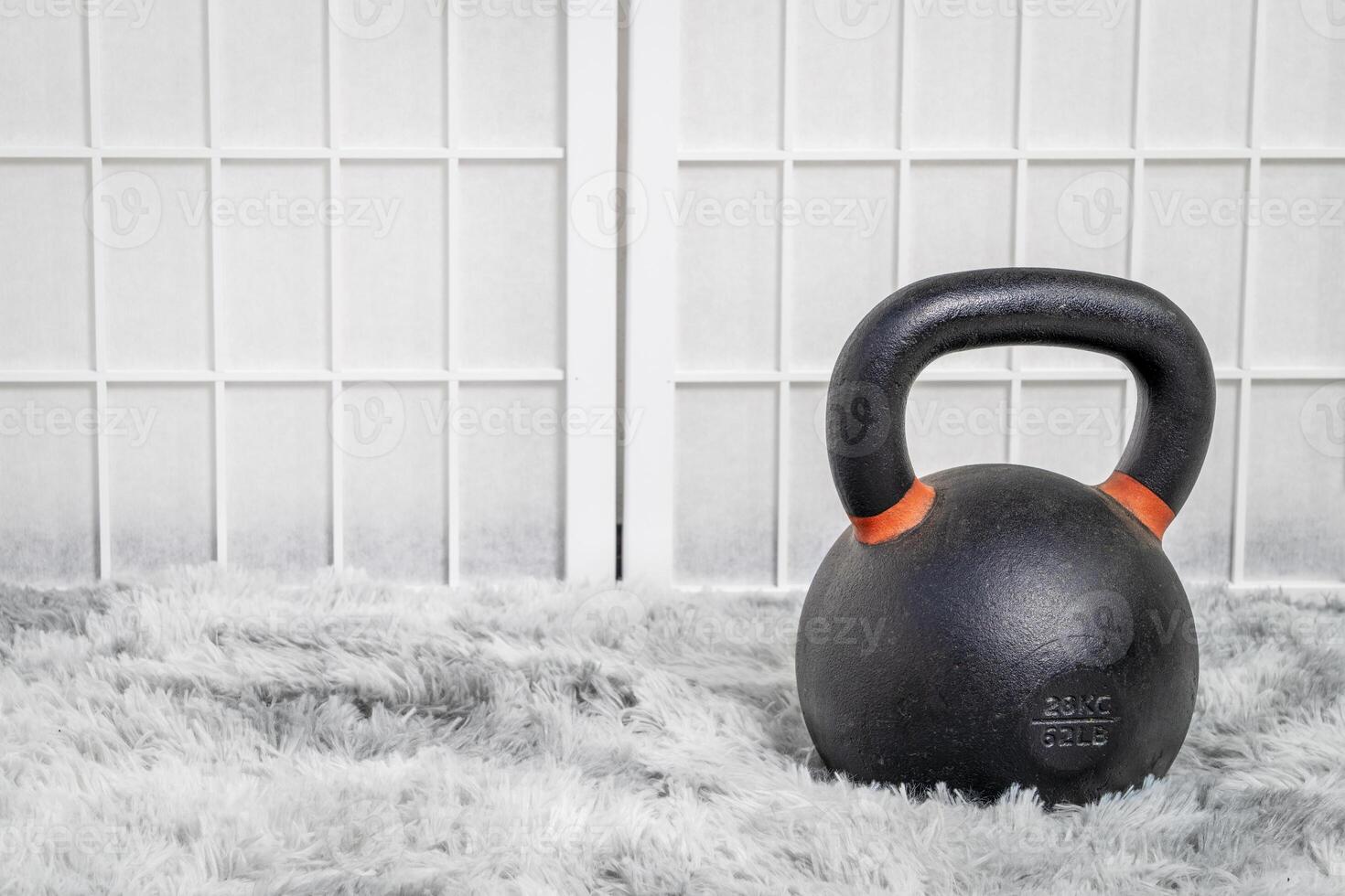 heavy iron kettlebell in a home gym, fitness concept photo