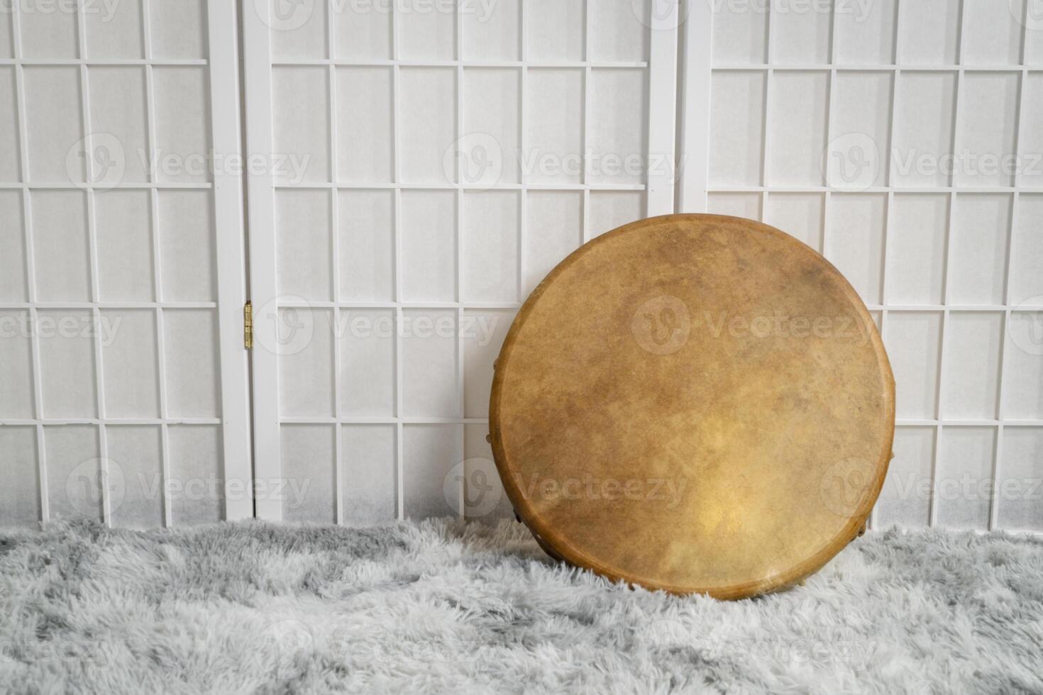 handmade, native American style, shaman frame drum covered by goat skin photo