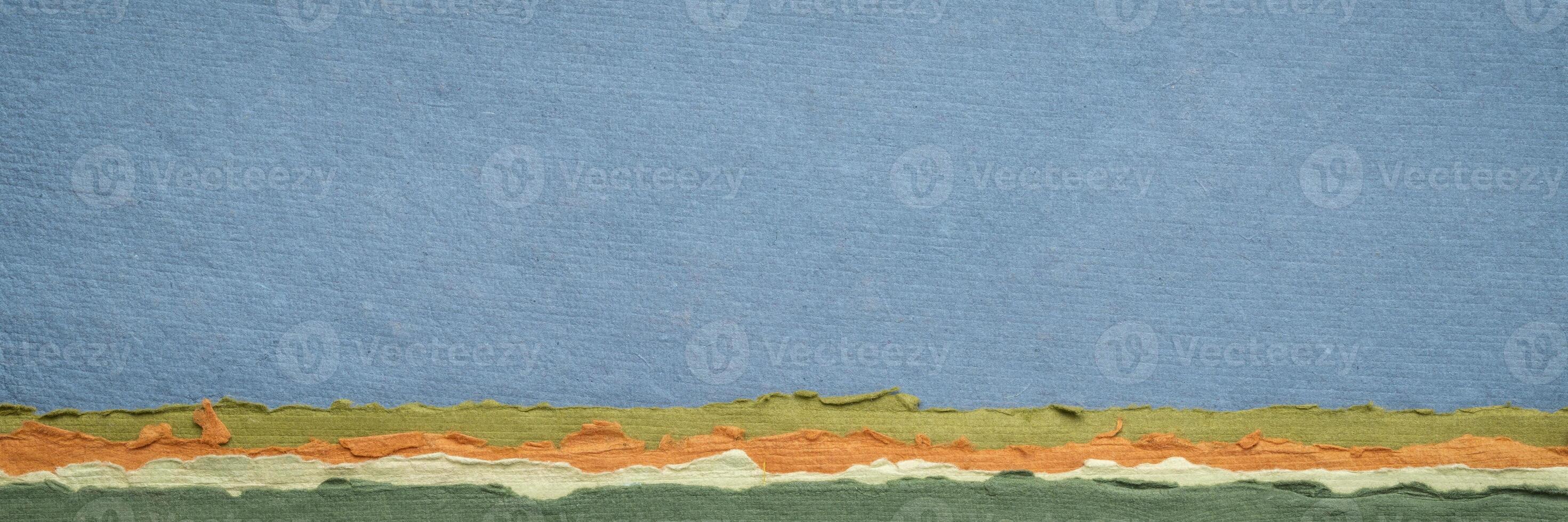 abstract landscape in pastel tones with a blue sky - a collection of handmade rag papers, panorama banner photo