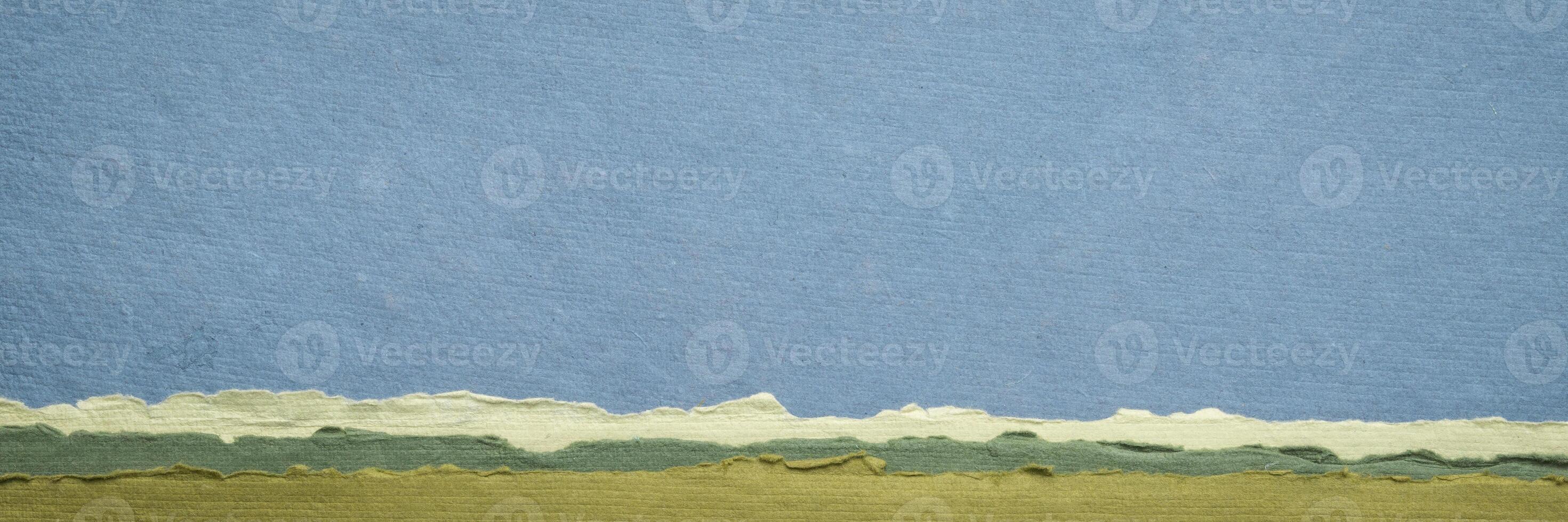abstract landscape in pastel tones with a blue sky - a collection of handmade rag papers, panorama banner photo