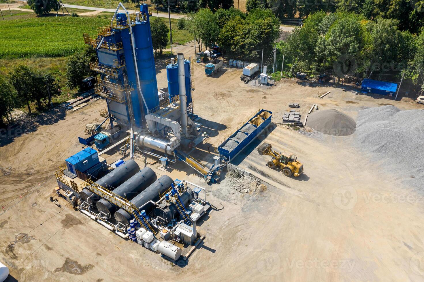 Construction site. Construction of a plant for the production of asphalt. Aerial view. photo