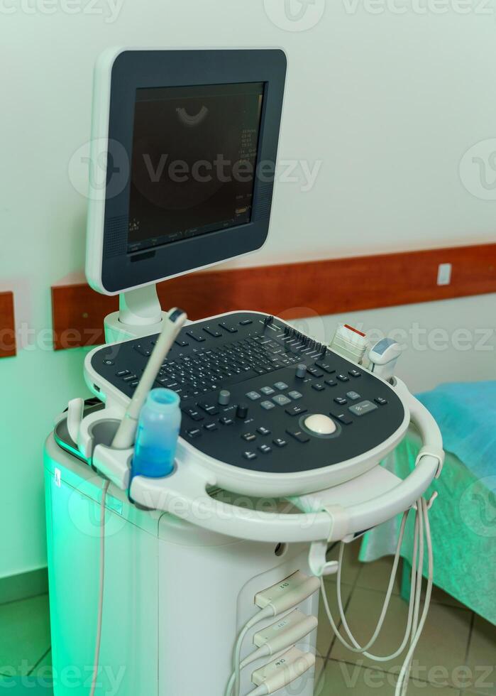 Ultrasound device for testing sonogram. Clinic interior. Sonography. Health tests concept. Closeup photo