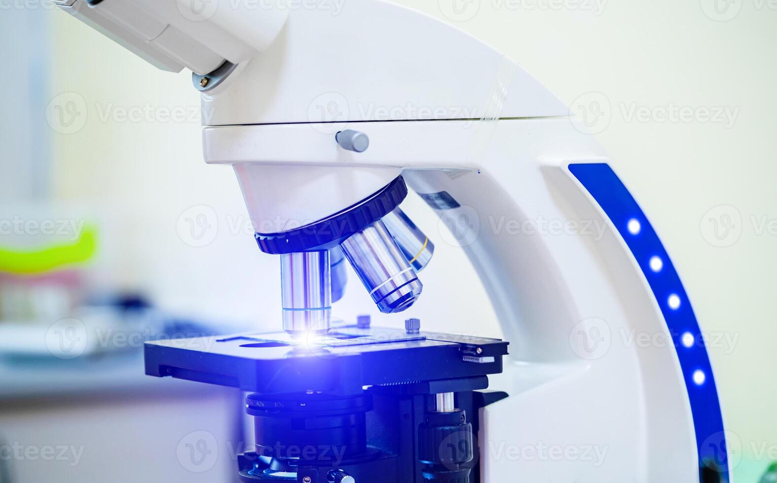Microscope in laboratory. Scientific and mediacal research concept. photo