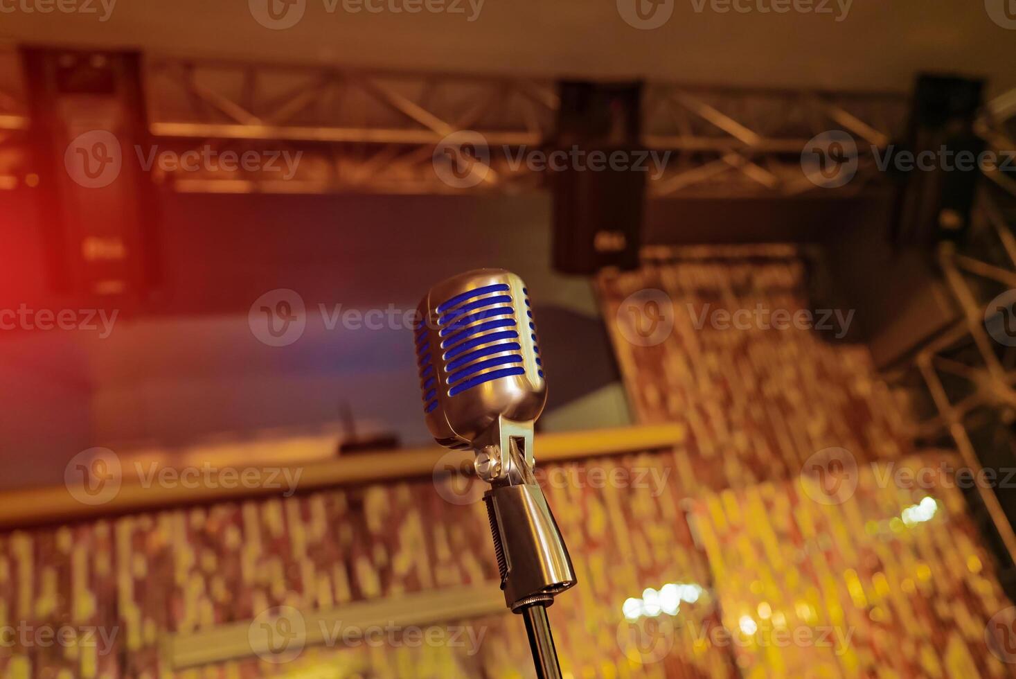 Metallic retro style karaoke equipment. Close up of old style microphone technology. photo