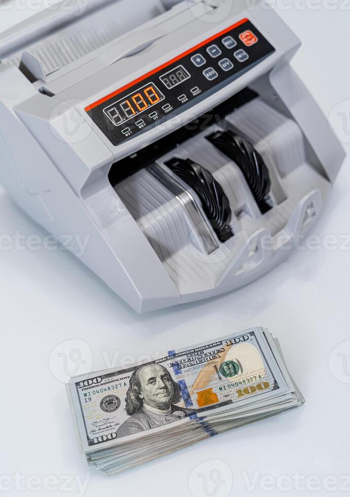 Cash counting machine. Bank equipment for count money. photo