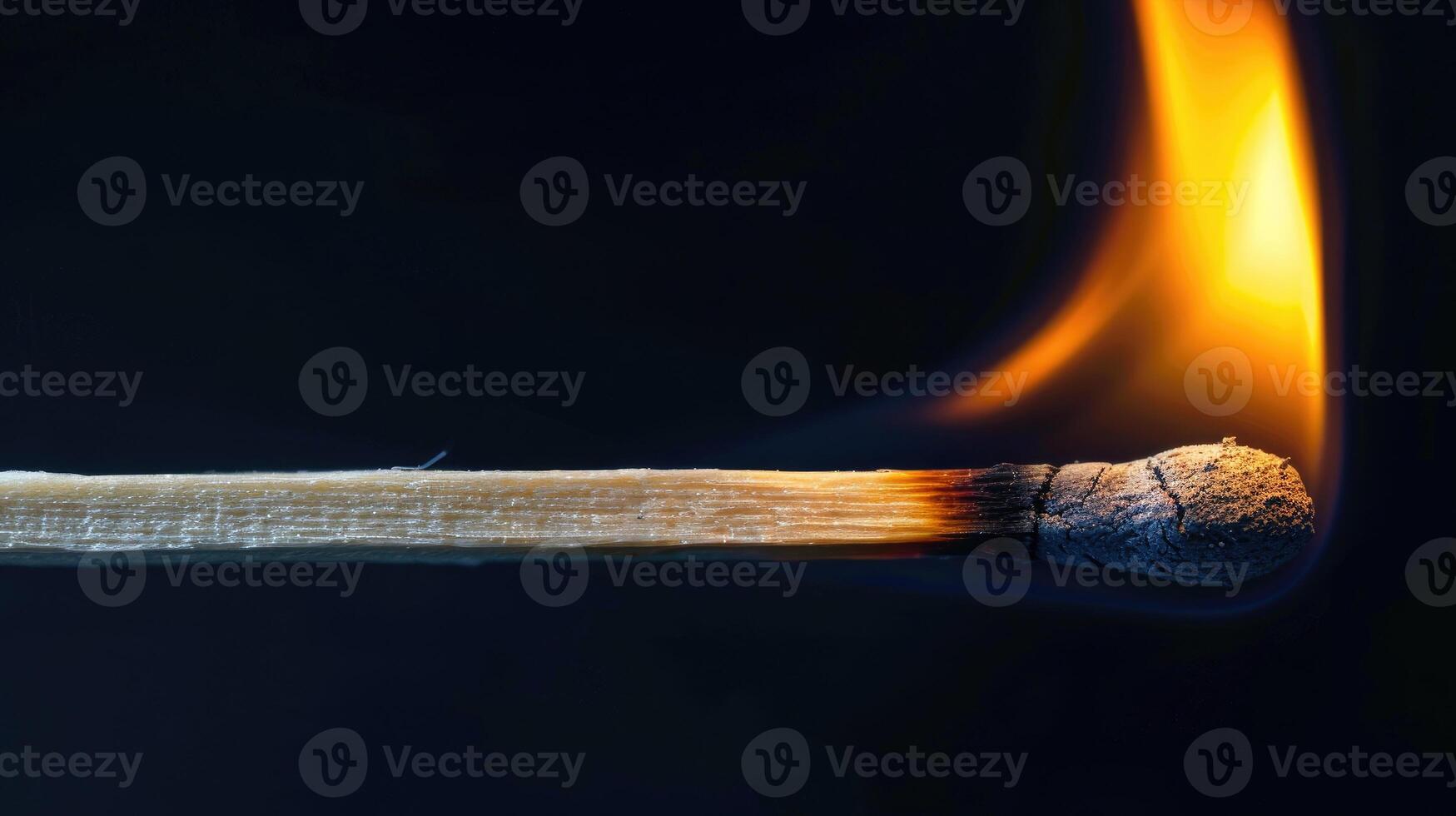 AI generated Witness the fiery intensity of a burning wooden match against a black background, a captivating and dramatic scene. Ai Generated. photo