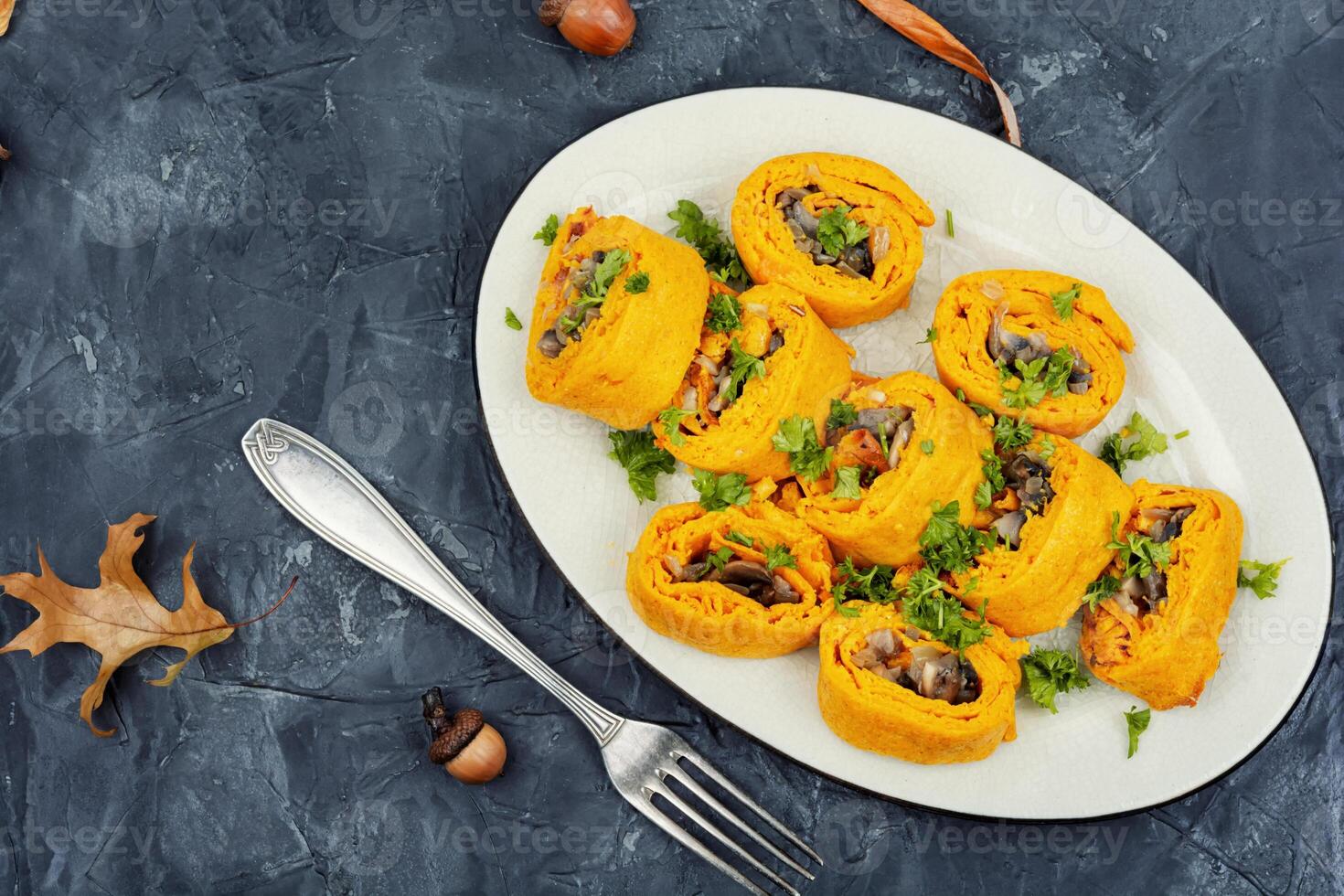 Pumpkin rolls with mushrooms photo