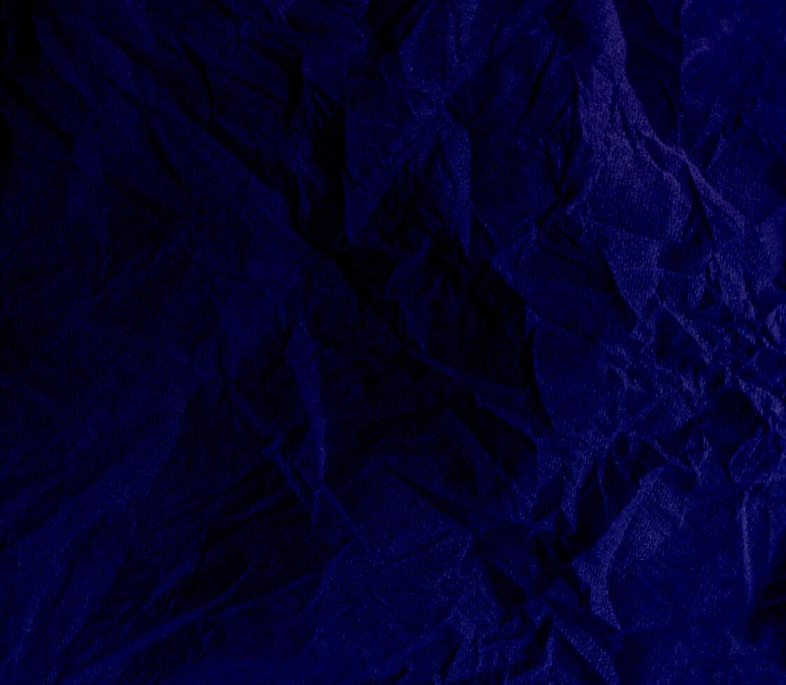 Abstract creased or wrinkled or crumbled paper texture background, Old and stained paper with grainy and wrinkled or crumbled stains. photo