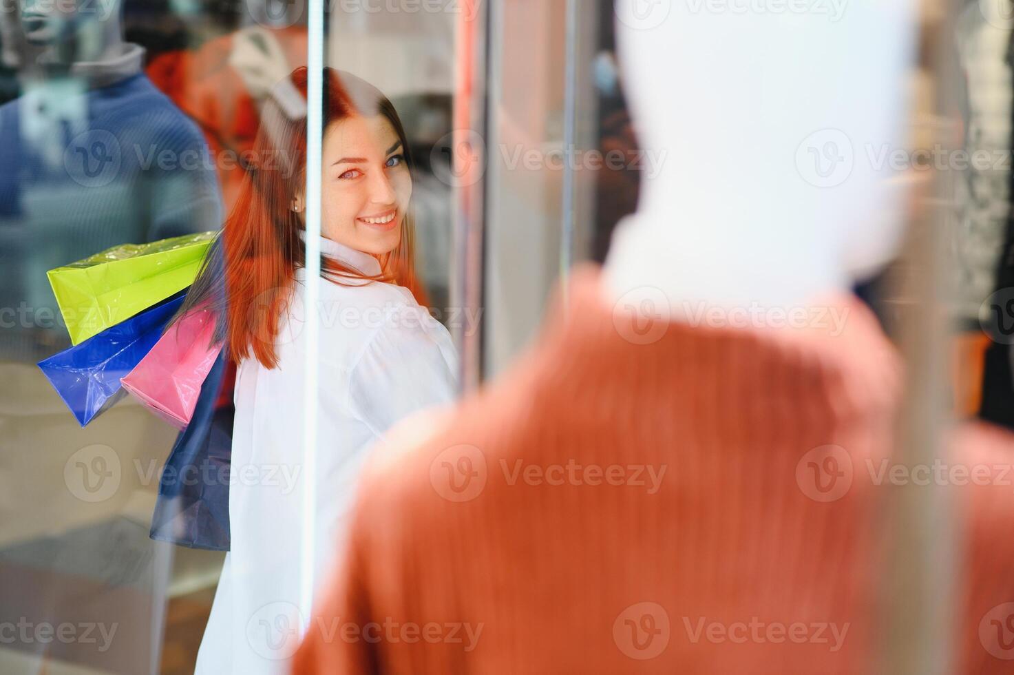 Fashionable girl shopping in a store. photo