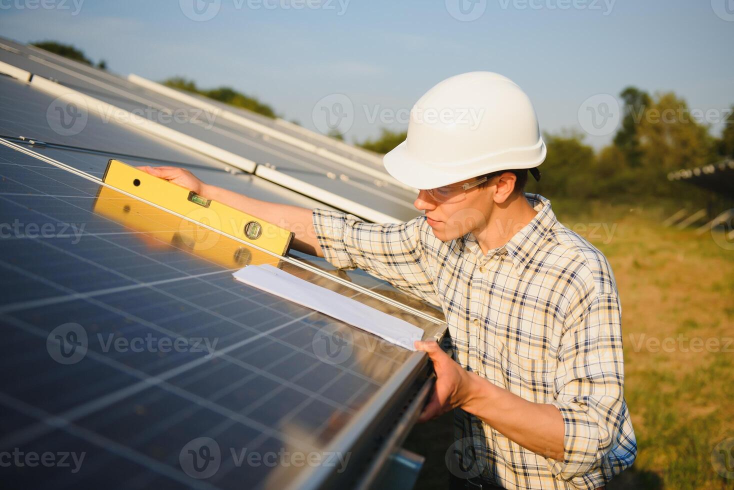 Renewable energy and solar power concept, worker or Electrical engineers are checking and training installing photovoltaic plant in solar power station alternative energy from nature photo