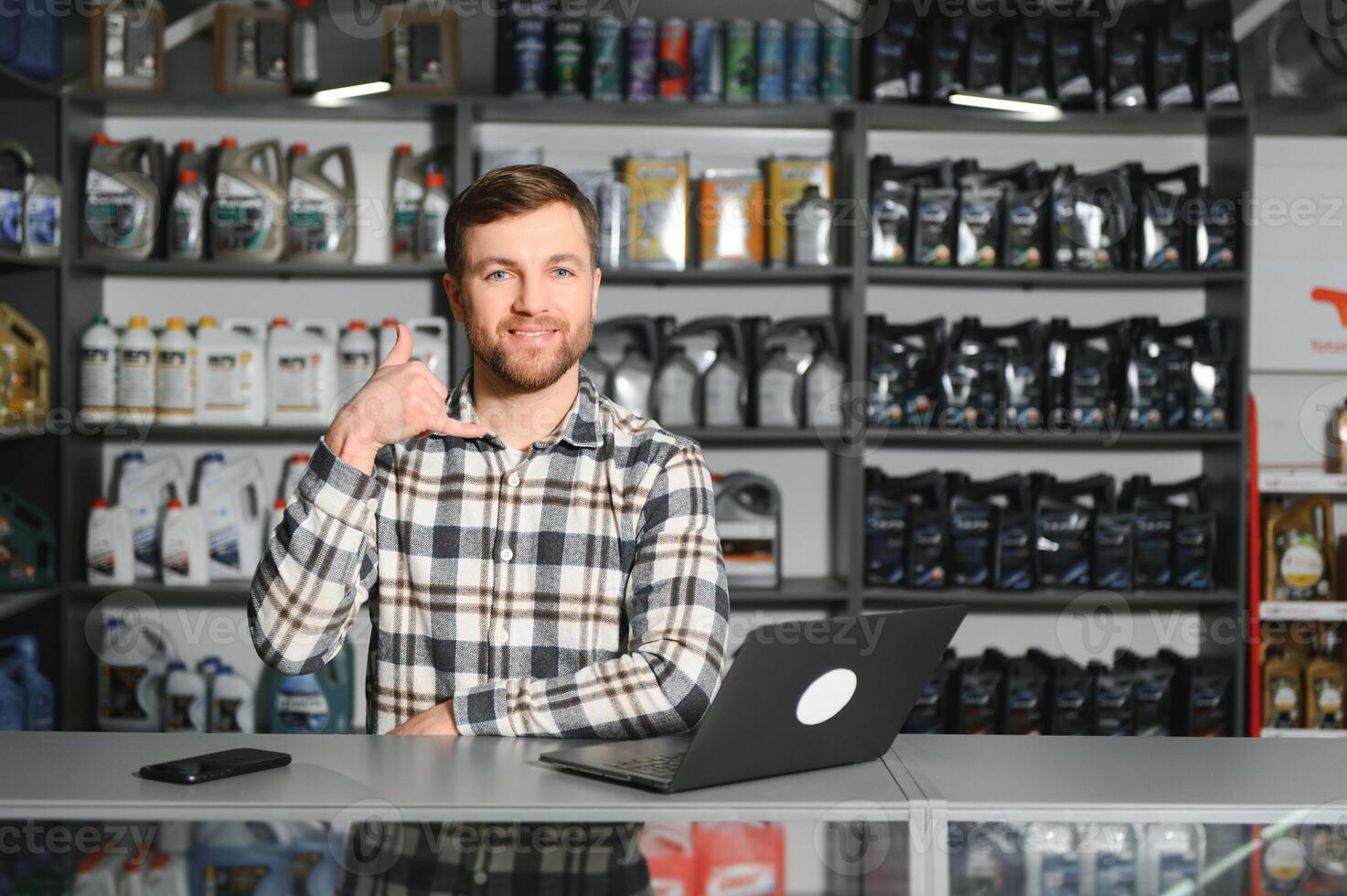 Smiling Salesman Auto Parts Store photo