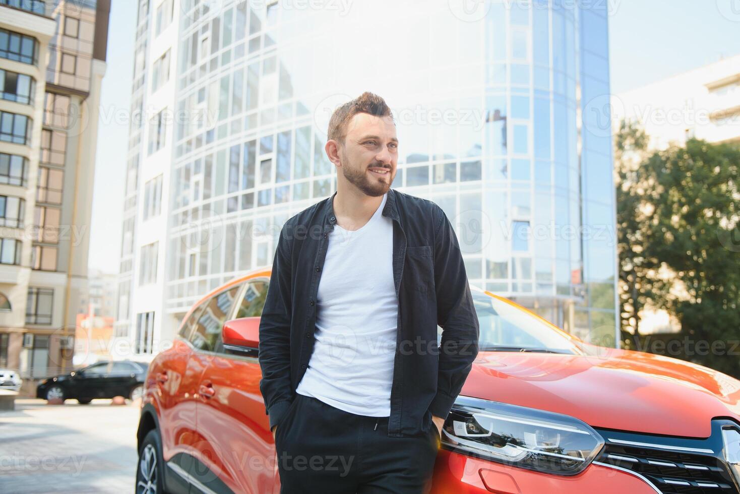 successful man near his car photo