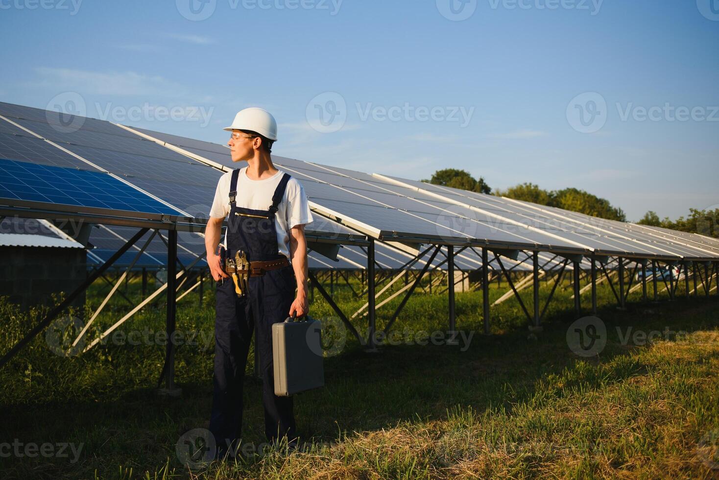 Renewable energy and solar power concept, worker or Electrical engineers are checking and training installing photovoltaic plant in solar power station alternative energy from nature photo