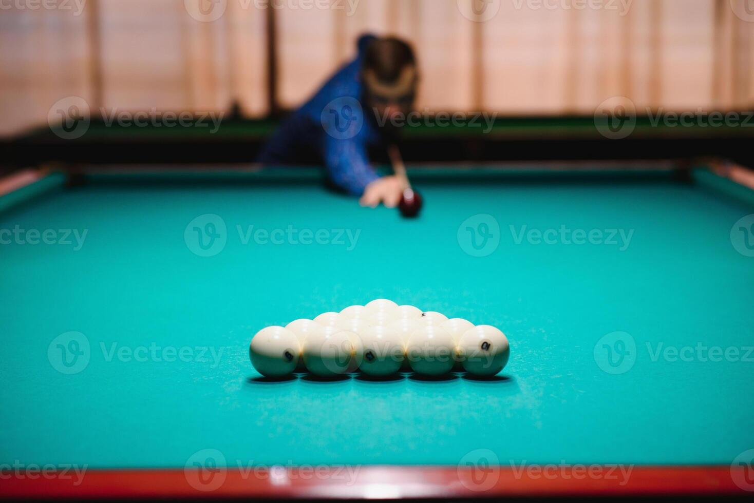 White billiard balls for Russian billiards, in a triangle on the table. photo