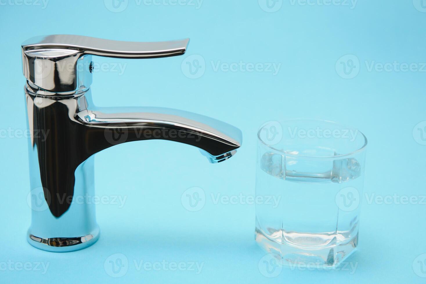 Double handle water tap. New chrome or steel mixer tap photo